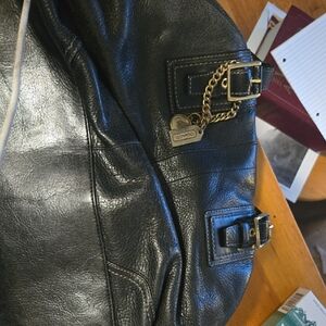 Coach Black Leather Shoulder Bag with Gold Chain Charm